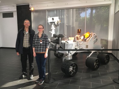 Peter and Maren in front of a full scale model of the Curiosity rover at JPL.